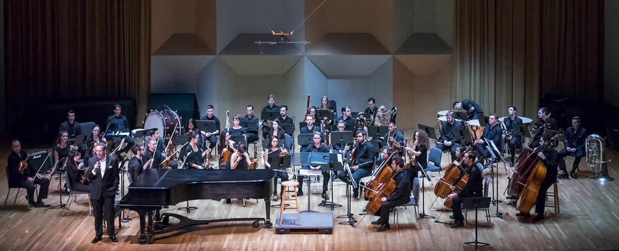 Orchestra ready to perform on stage